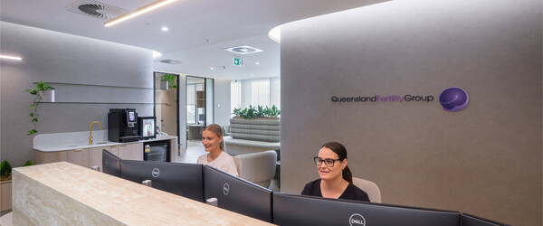 Two receptionists siting in new clinic