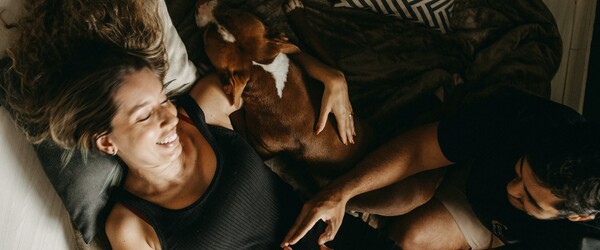 couple laying on couch